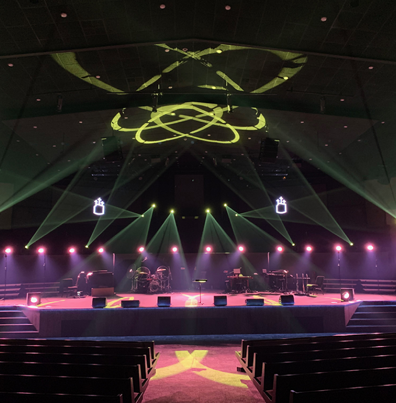 Stage with green lights and lasers